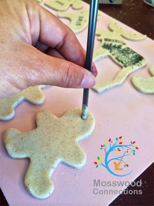 Poking Holes for the Salt Dough Ornaments