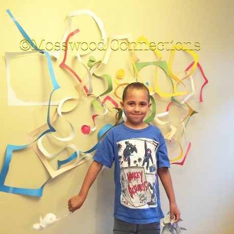 Rainbow Spaghetti Wall; a Fine Motor Adventure. Practice Scissor Skills and Make Fun Wall Art Hand strength, pincer grasp, visual-spatial skills, scissor & pre-writing skills #mosswoodconnections #finemotor #scissorskills #crafts